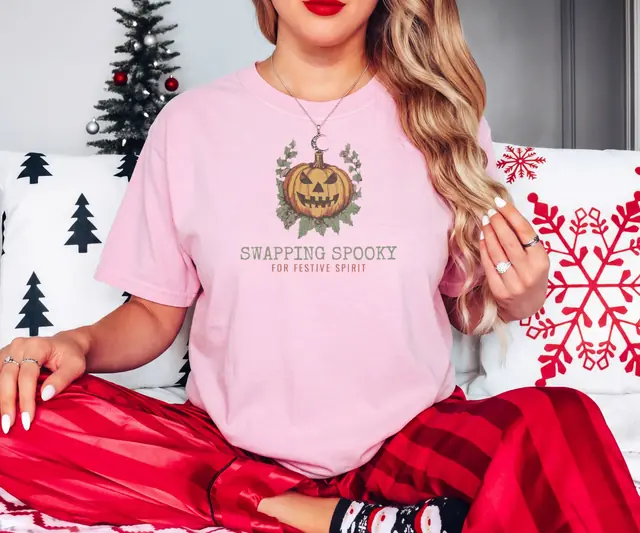 Person wearing a Blossom tee printed with SWAPPING SPOOKY, FOR FESTIVE SPIRIT